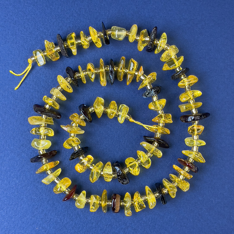 Amber Beads Grains 10-12×4mm+- with seed beads, diameter 3mm+- on thread, length 38cm+