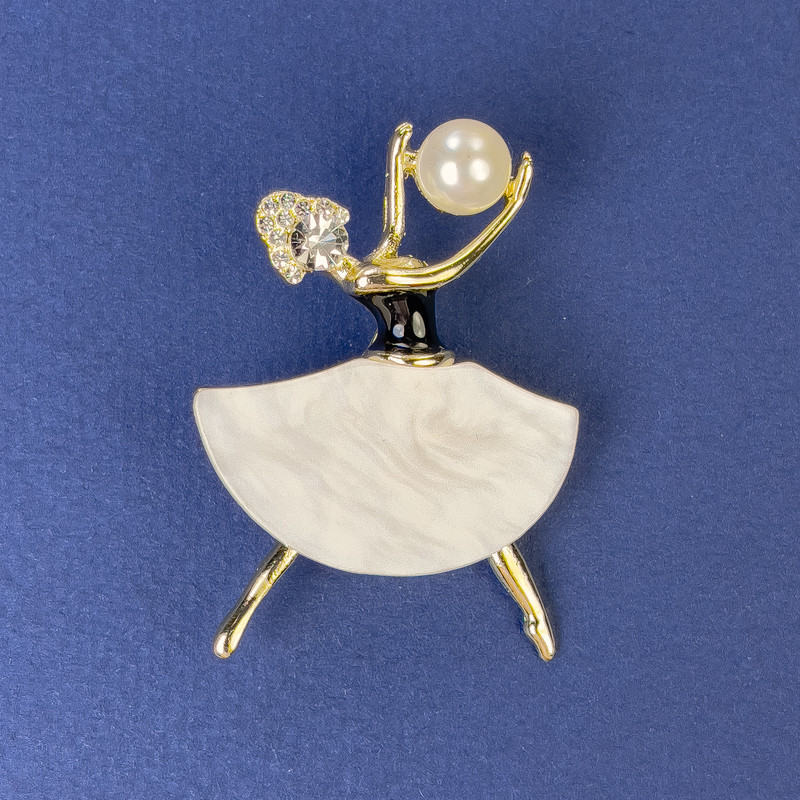 Pendant-brooch 'Girl' with Pearlized tint, white rhinestones, golden metal 47×32mm± with pearl