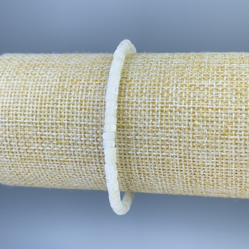 Bracelet, Mother-of-Pearl Rondelle, diameter 4x2mm ±, length 18cm ± Stretch