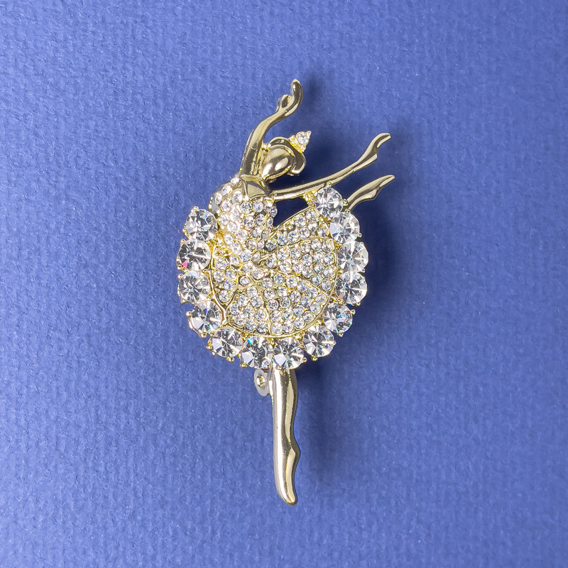 Brooch 'Ballerina' with white crystals, gold-toned metal