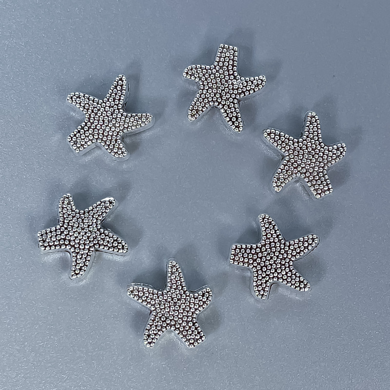 Pendant Bead Star Inlay Metal Color Silver, Ø 10x3mm± hole Ø 1mm± packaging 11 pcs