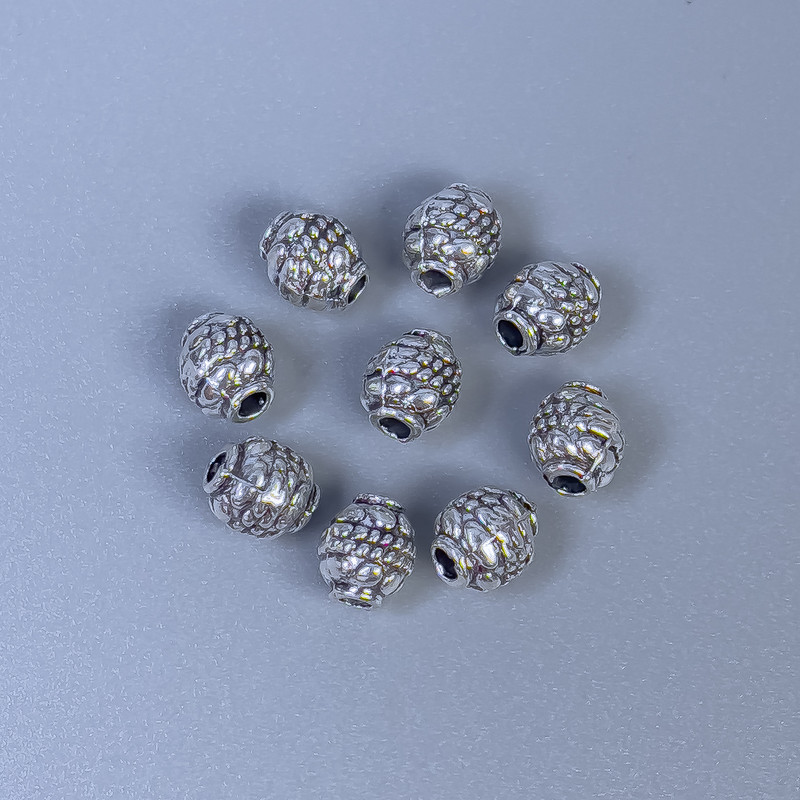 Bead centerpiece (insert) color: silver metal, hole 1.5 mm, bead diameter 6×5 mm ±; packaging 20 g (~50 pcs)