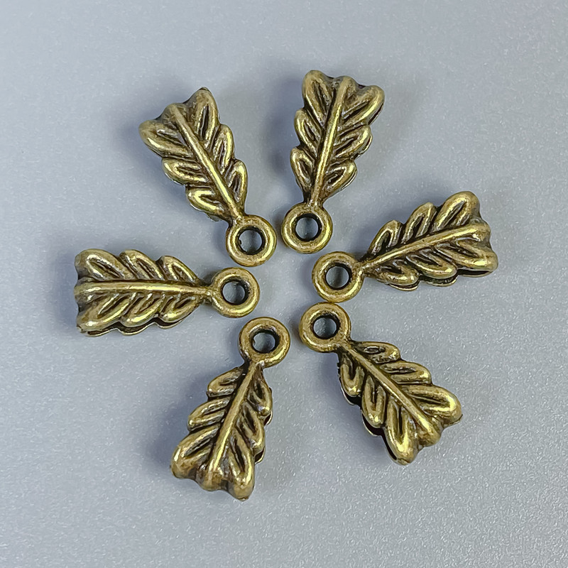 Bronze-colored bail findings, size 14×7×5 mm ± holes diameter ~2.5 mm and 1.8 mm ± packaging 22 pcs
