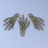 Pendant Findings Skeleton Hand, metal color bronze, size 35×19×2 mm± hole diameter 3 mm± packaged 20 g (~ 9 pcs)