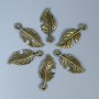 Pendant Finding Leaf Bronze Tone, size 23×10×1 mm±, hole diameter 2 mm±, packaged 20 g (~26 pieces)