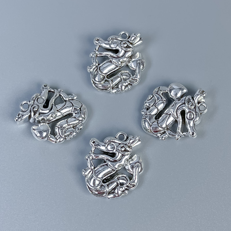 Pendant Fittings Dragon color: silver, size 21×17×7 mm± hole diameter 1.2 mm± packaging 4 pcs