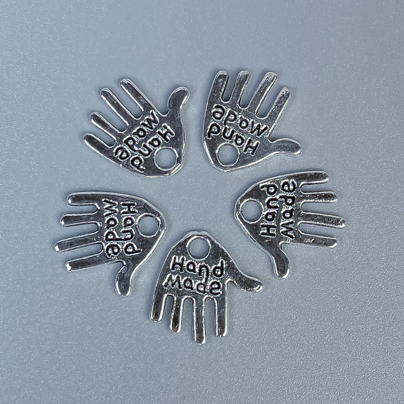 Pendant hardware palm Hand Made metal color silver, sizes 12x11x1mm+- hole diameter 1.5mm+- packaging 20g (~50 pcs)