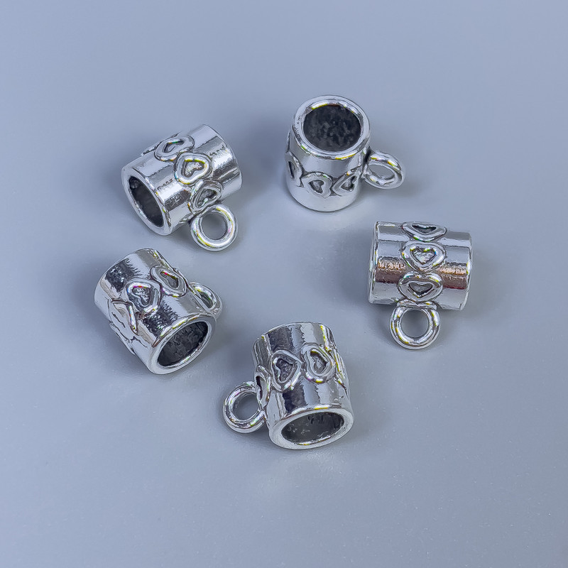 Findings bail color of metal silver, sizes 9×8×7 mm± holes, diameter 5 mm±, diameter 2 mm± packaged 14 pcs