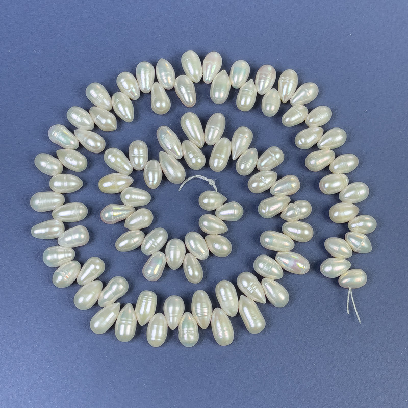River Pearls, Oval "Butterfly" 9x6mm ± on a Thread, Length 41cm+
