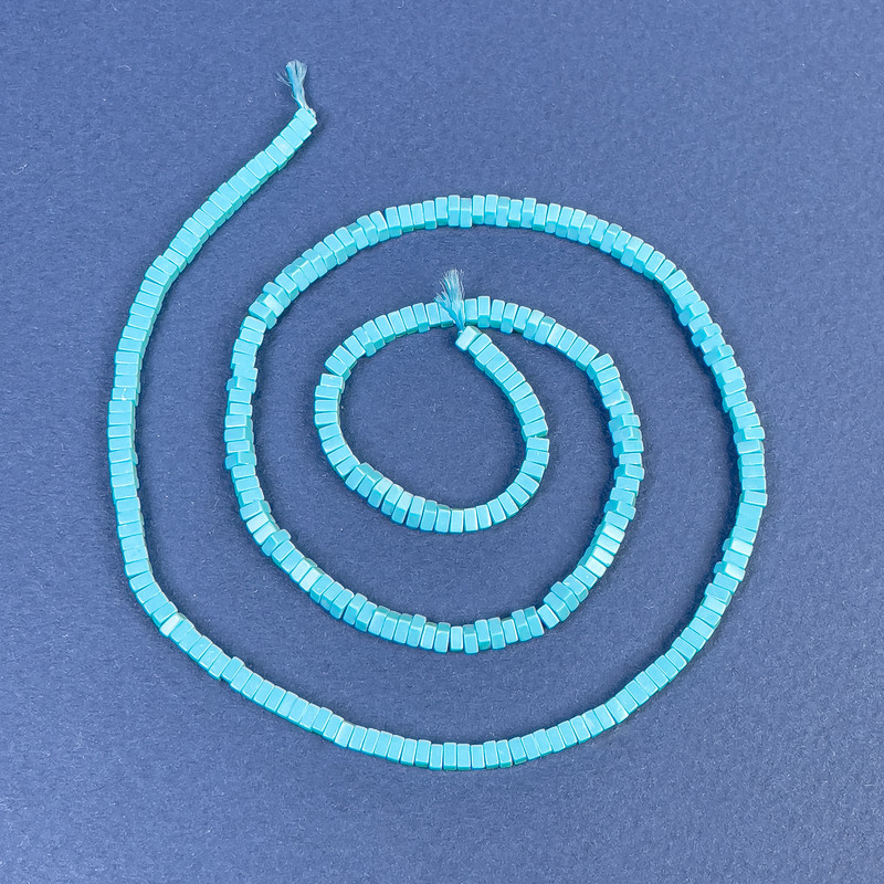 Turquoise beads (single) square rondelle 2.5x1mm+- on a thread, length 39cm+
