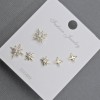 Posts Earrings 10-6mm± golden metal with white rhinestones