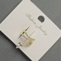Earring Café Piercing 'Snake' in Golden Metal 12x14mm± with White Crystals