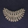 Brooch 'Feather' with white crystals, silver metal, diameter 50x43mm +