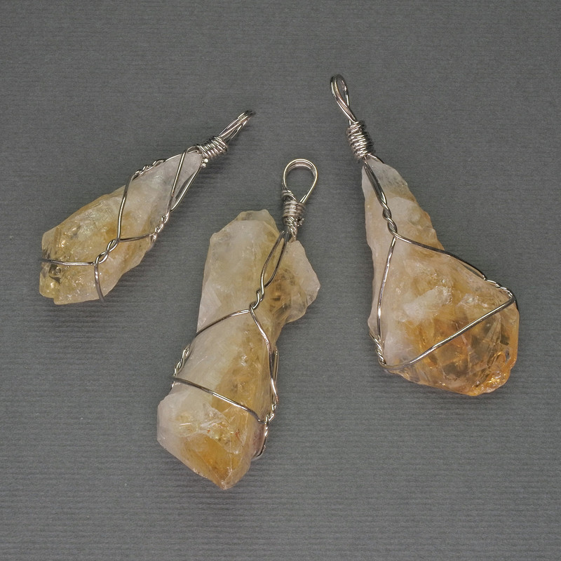 Unpolished Citrine Pendant in Weave 60x40x18mm+- assortment size