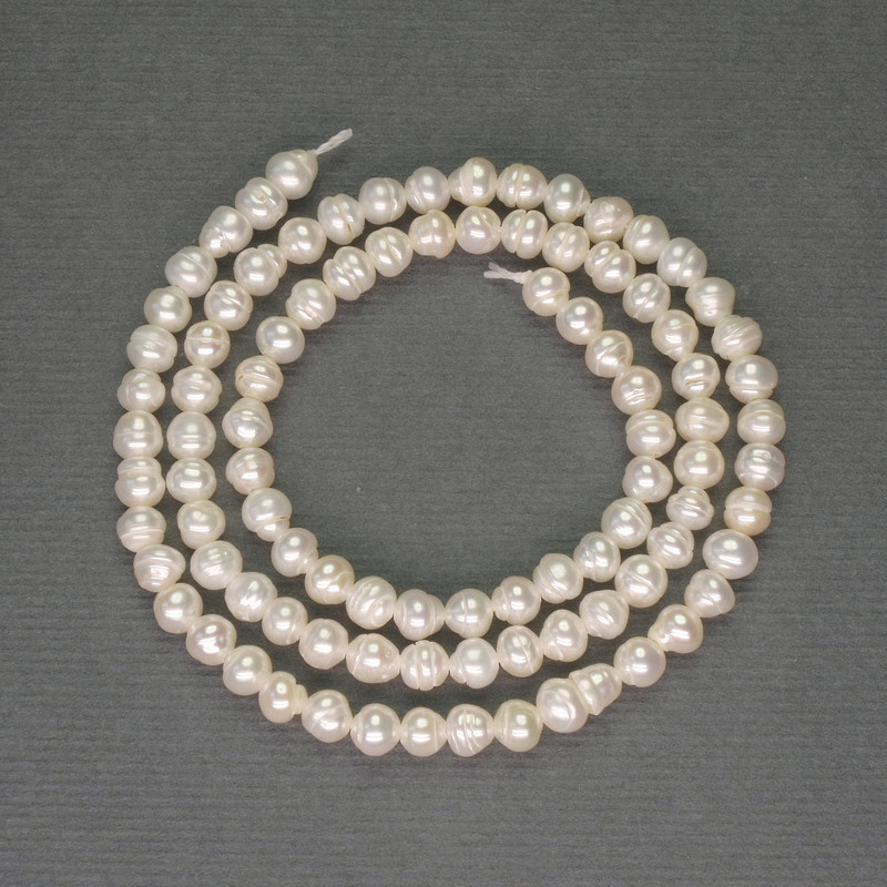 Freshwater White Pearls on a Thread, diameter 4×3.5 mm ± on thread, length 36 cm ±