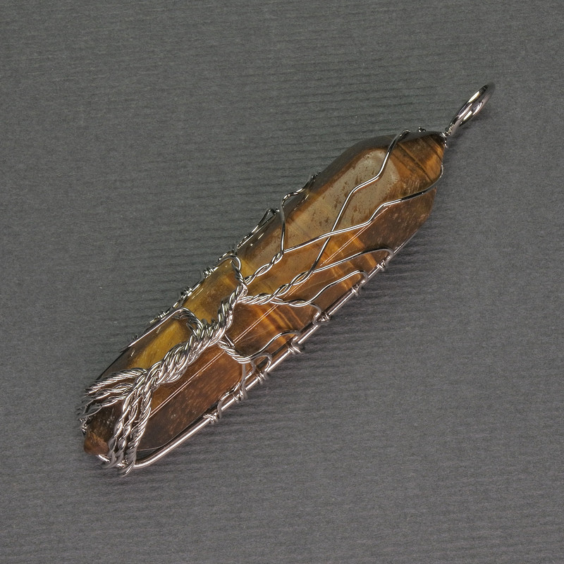 Tiger's Eye Hexagonal Pendant Crystal 12x50x57mm+- in Silver Plated Wire</name