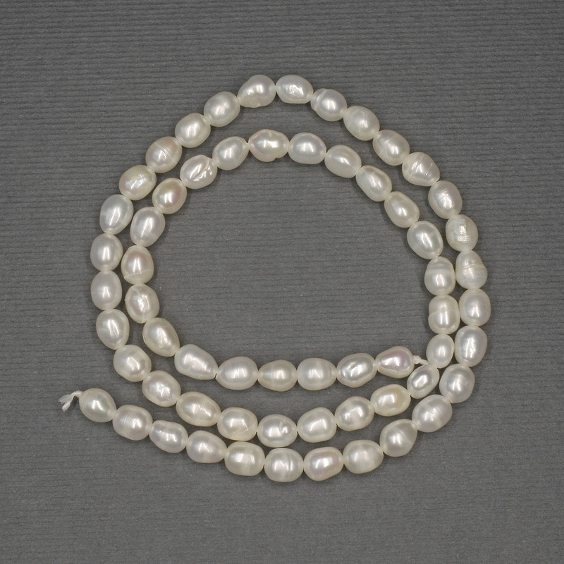 Freshwater White Oval Sea Pearls on a String, diameter 6x4, 5-5mm± on a thread, length 36cm+