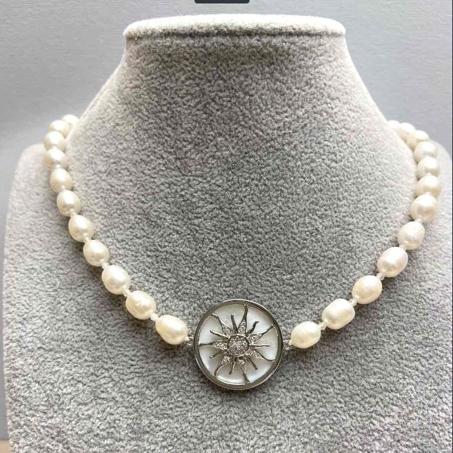 Necklace with River Pearls oval, 10x7mm+-, Sun Motif Pearl Inlay, diameter ~25mm+-, length 46cm +- with silver metal clasp