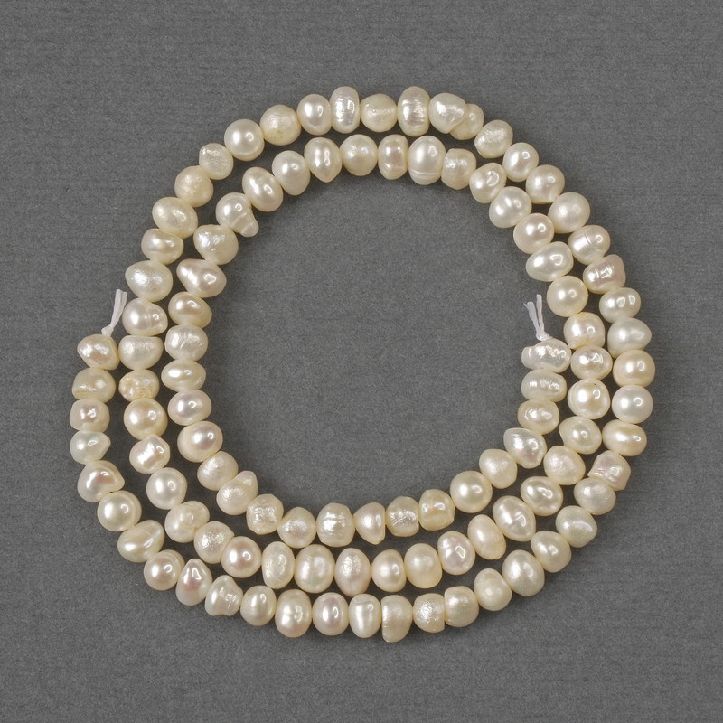 Natural freshwater pearl beads 4x5mm, on a thread, length 36 cm ±