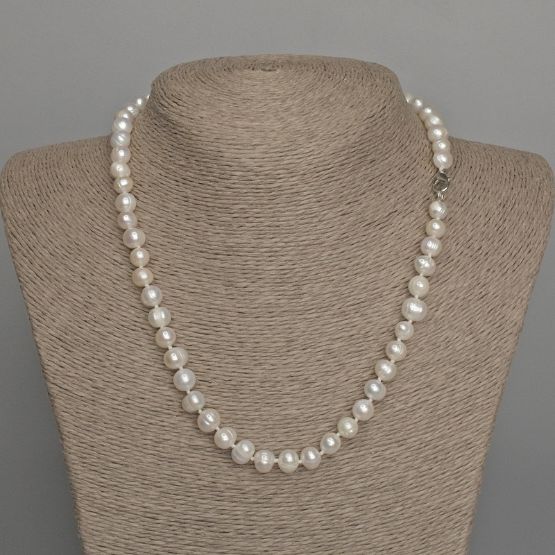 Necklace of natural freshwater pearls 7.5-8x6-7 mm, length 46 cm, with clasp