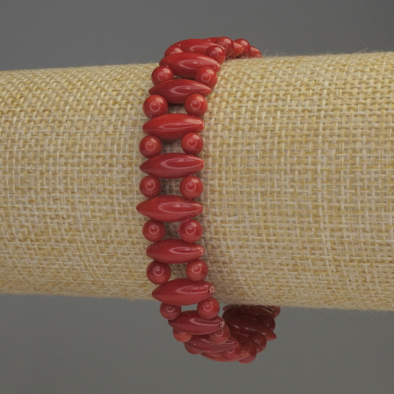 Coral Bracelet on Double Strand, diameter 13x5mm+-, smooth bead, diameter 4mm+-, length 18cm stretch