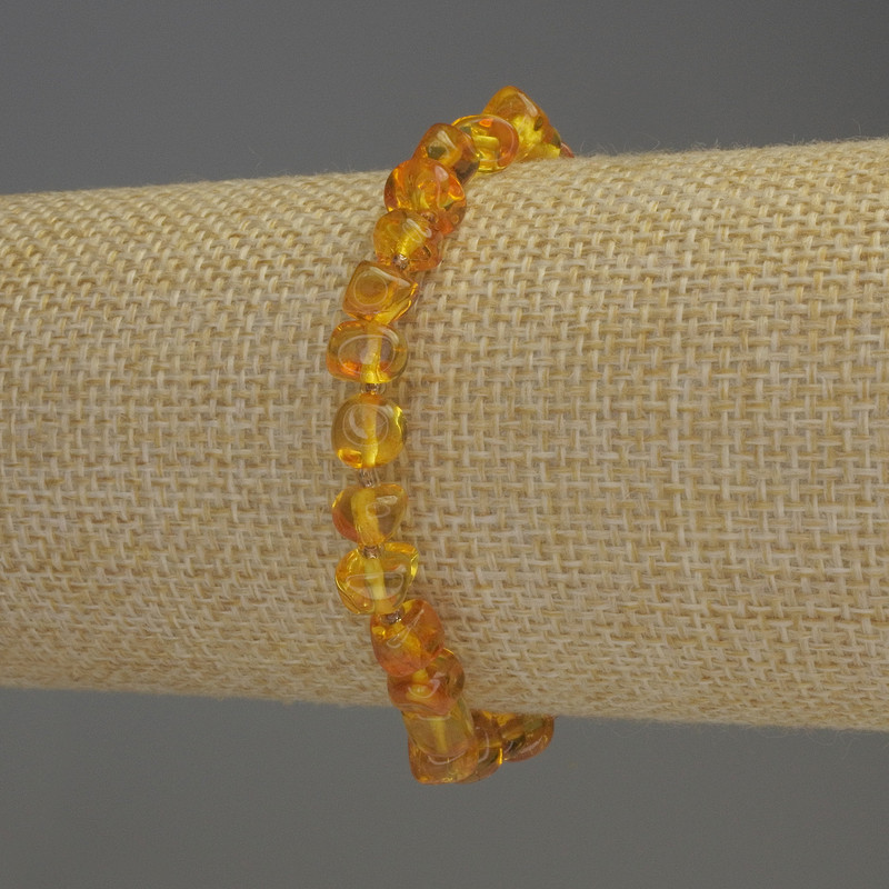 Amber Bead Bracelet with Faceted Beads 7x5mm+-, 2mm+ beads, length 18cm+- stretch