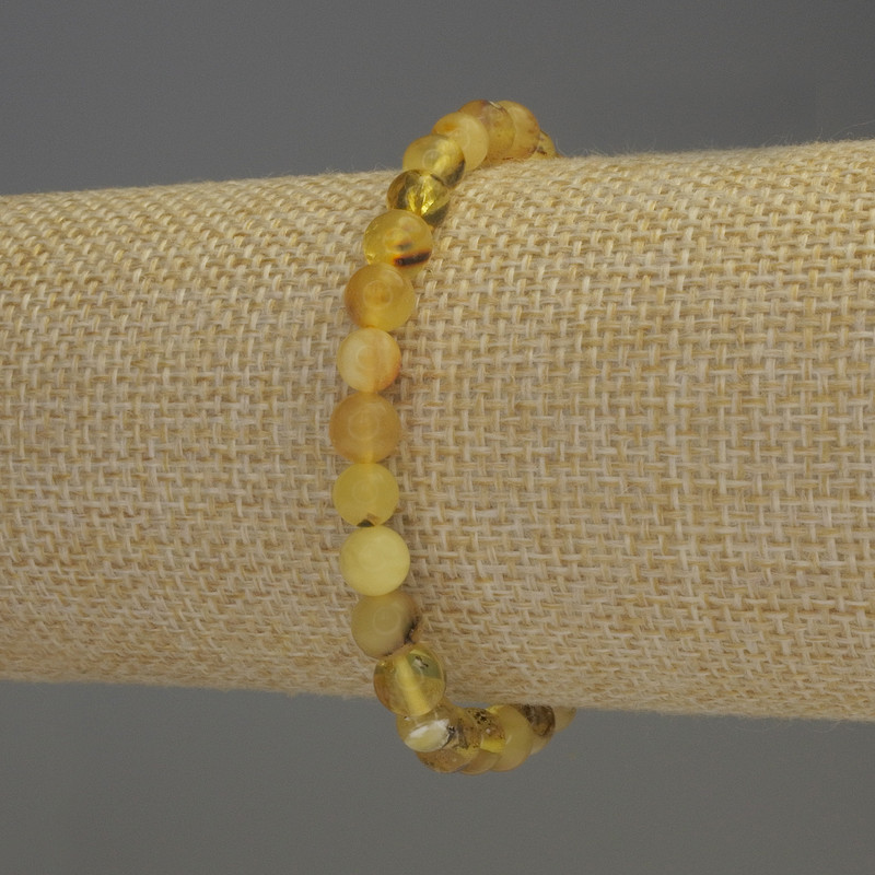 Bracelet Amber smooth bead, diameter 7mm±, length 18cm± stretch