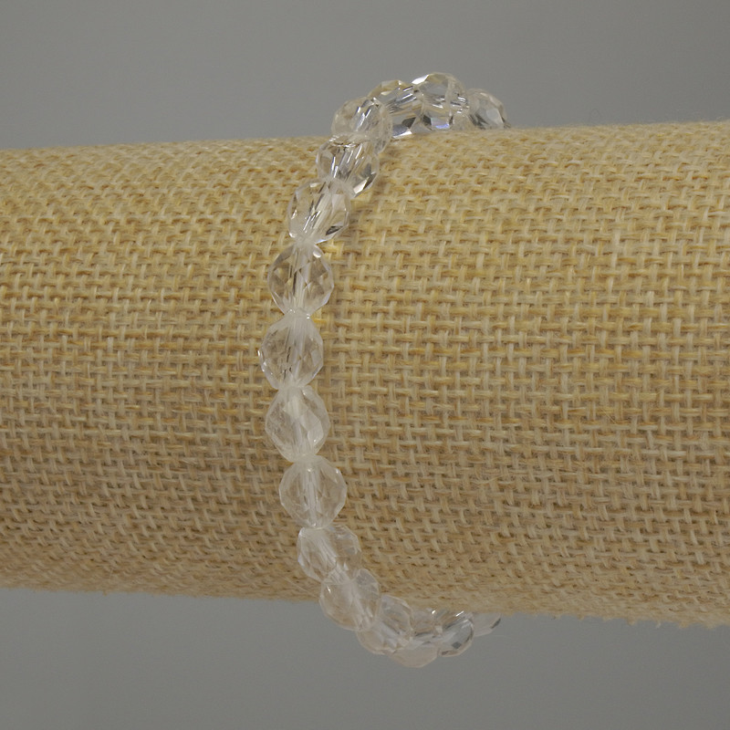 Bracelet Mountain Crystal Faceted Bi-cone, 6mm diameter ±, 18cm length stretch