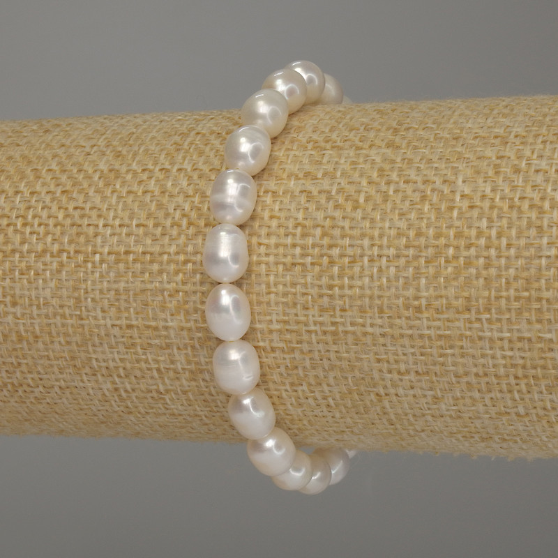 Bracelet with Freshwater Pearls, oval, diameter 8×6 mm ±, length 18 cm (stretch)