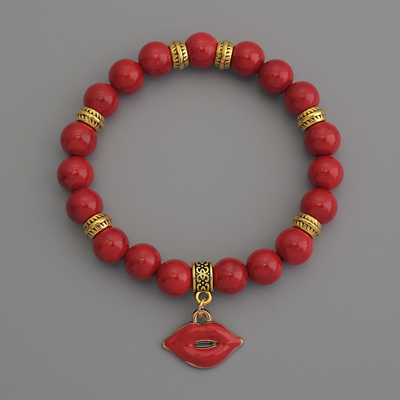 Bracelet Coral (each) smooth bead, diameter 8mm+- with metal inserts, length 18cm stretch