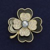 Shamrock Brooch with Pearl and White Rhinestones, Golden Metal, 38x45mm ± on Magnet