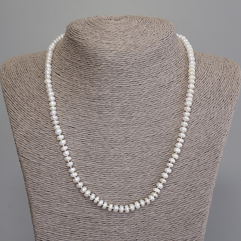 Necklace of natural freshwater pearls 5x3mm +-, length 47cm +- with clasp