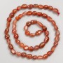 Carnelian Beads faceted on thread, diameter 8-10 mm, length 40 cm