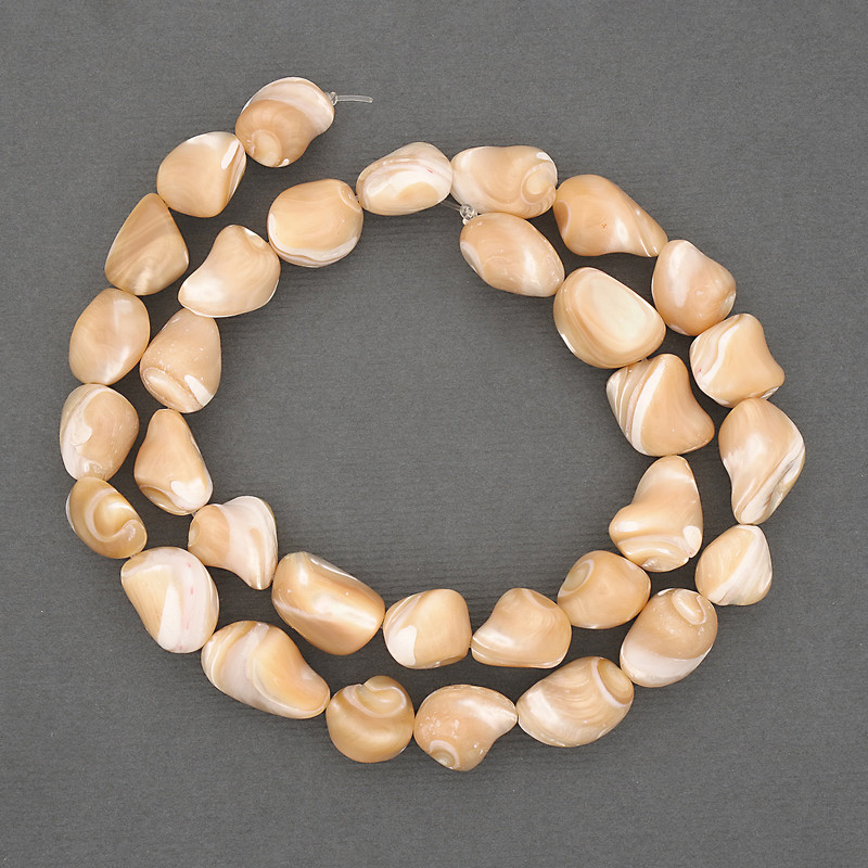 Natural Pearl Beads on Thread Beige. Barrel-shaped mother-of-pearl, diameter 10-12x8-10mm +-, length 40cm+- on thread