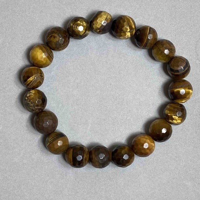 Bracelet Tiger’s Eye faceted bead, diameter 10mm±, length 18mm±, stretch