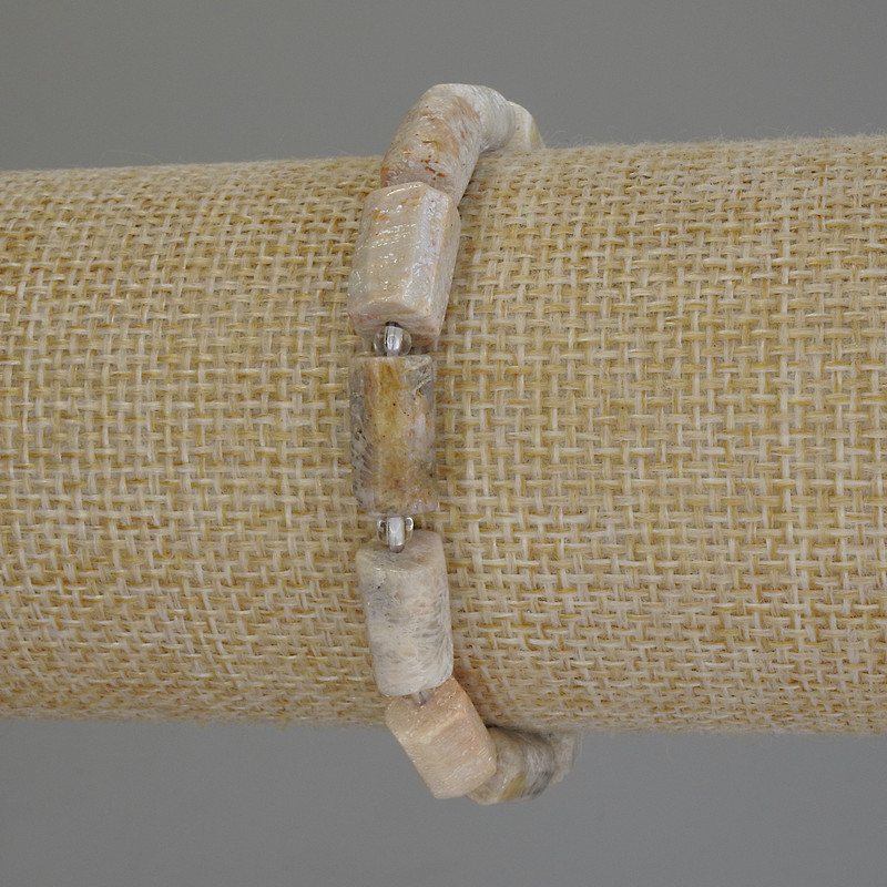 Bracelet of Fossilized Coral with Faceted Cut, diameter 12x7mm± beads 3mm±, length 18cm±, stretch