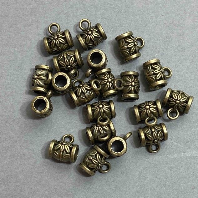 Bronze-colored bail findings, dimensions 9x7x10 mm±, hole diameters 4 mm±, 2–3 mm±, packaging 20 g (~21 pcs)