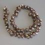 Mother-of-P pearl beads Spiral shell cut, diameter 8-11×6-8, 5mm±, length 35cm± on thread