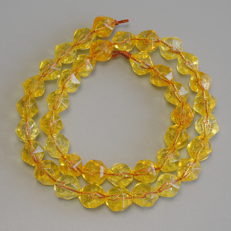 Citrine Beads, multi-faceted, diameter 9.5x8.5mm, string length 37 cm ± on thread