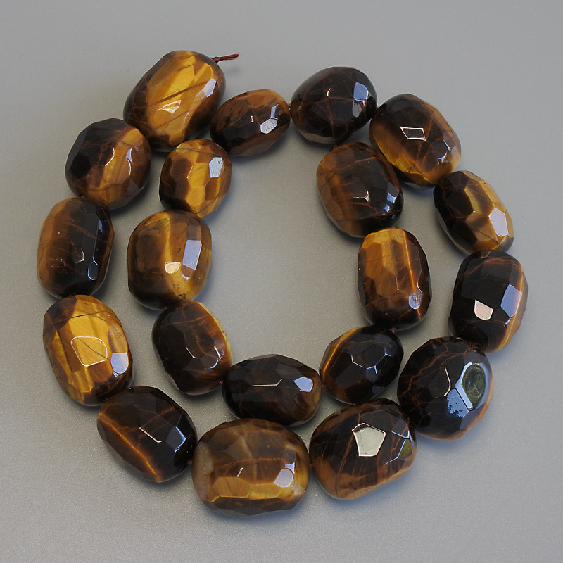 Tiger's Eye Beads Faceted Pearls, 18-21×13-16 mm, +/- diameter, 39 cm +/- on thread