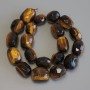Tiger's Eye Beads Faceted Pearls, 18-21×13-16 mm, +/- diameter, 39 cm +/- on thread