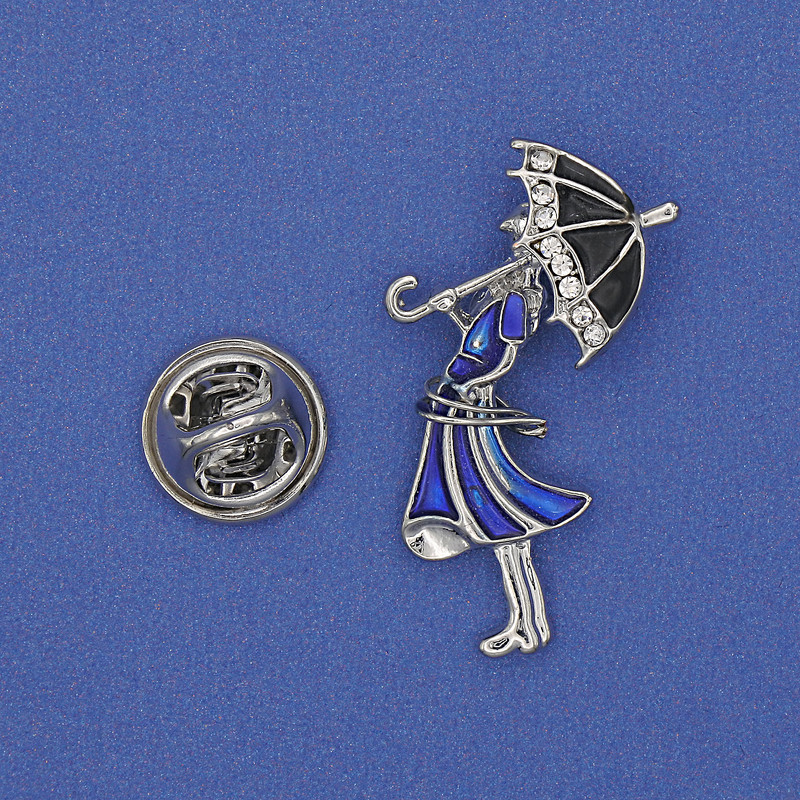 Brooch 'Girl with an Umbrella' with white crystals blue enamel gold-toned metal 32x16mm+