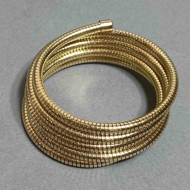 Elastic flexible golden metal bracelet, diameter 68mm+