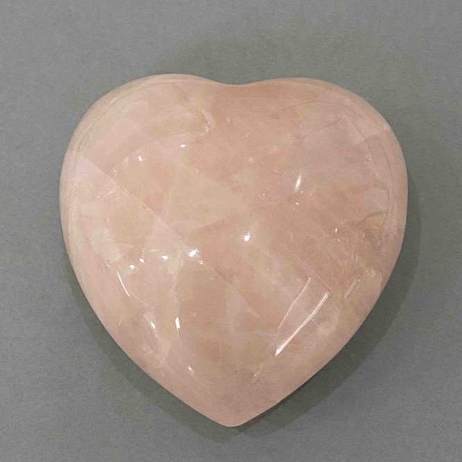 Souvenir Stone - Heart from Rose Quartz, diameter 60-85×60-85×30-45mm± assorted sizes, weight from 150g (Price per 100 g)