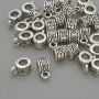 Bail, silver color, metal finish, size 6x5x10 mm ±, holes diameter 4 mm ± and 2 mm ±, packaging 20 g (~30 pcs)