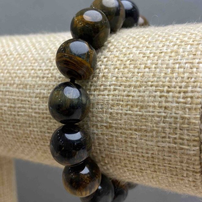 Bracelet Tiger's Eye and Hawk's Eye natural stone, smooth beads, diameter 12(±)mm, length 18cm (stretch)