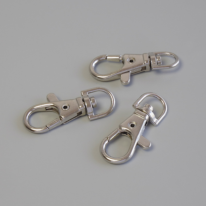 Price per pack / 10 pcs. Lobster clasp, diameter 37×16 mm metal color: silver