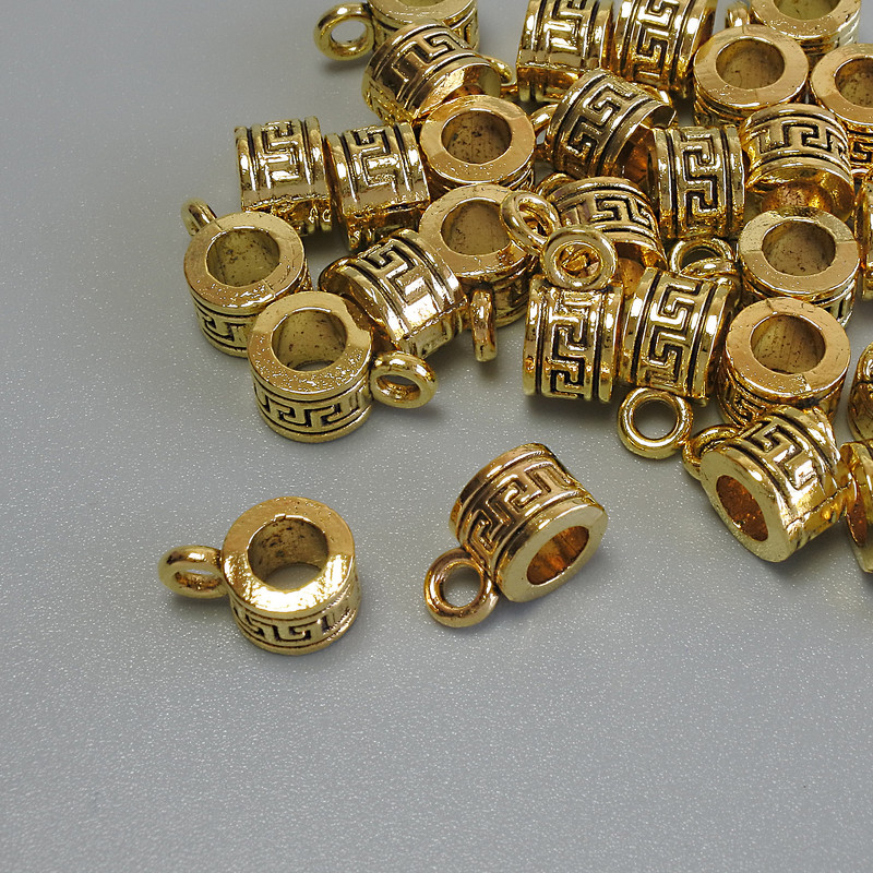 Bale bail in metal color gold, size 6.5×5×9.5 mm, holes 4 mm and 2 mm, packaging 20 g, 29 pcs