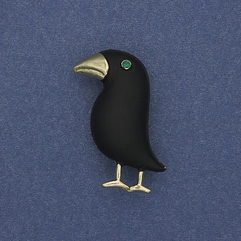 Brooch 'Bird' in black matte with green rhinestone and golden metal 36x21mm+