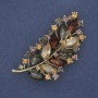 Brooch 'Branch' with Colored Rhinestones on Golden Metal 71x35mm+